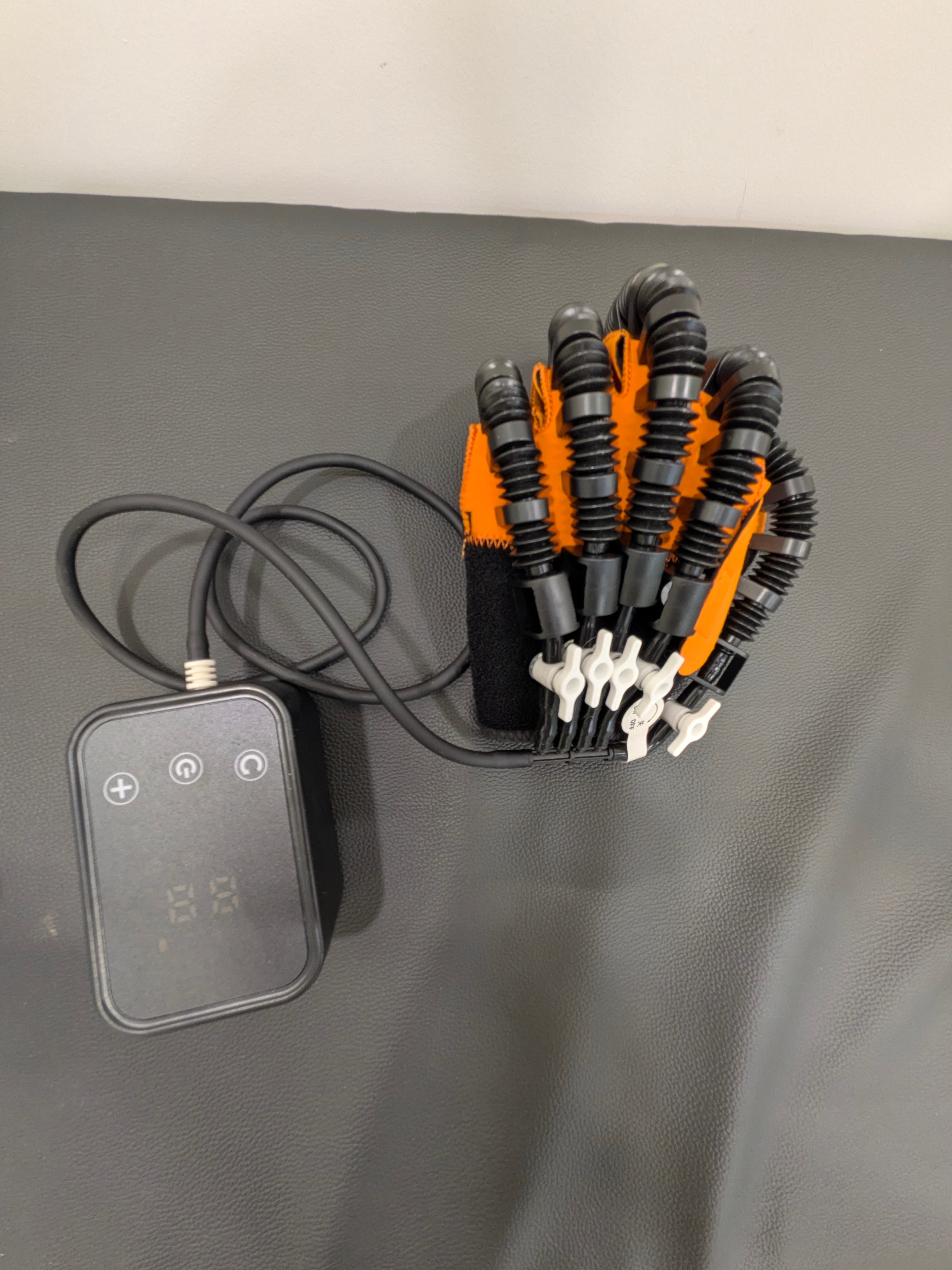 Robotic hand rehabilitation glove